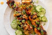 Grilled Bang Bang Salmon Skewers with Crisp Cucumber Salad