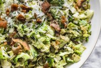 Shredded Brussels Sprouts Salad with Lemon Parmesan Dressing