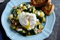 Summer Zucchini Skillet with Poached Eggs and Garlic Brown-Butter Baguette
