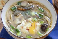 Creamy Mushroom and Chicken Noodle Soup with Poached Eggs