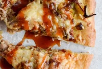 Maple-Leek Pulled Pork Pizza with Roasted Garlic and Aged Cheddar