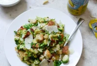 Warm Brussels Sprouts Caesar with Bacon Ciabatta Croutons