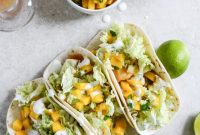 Beer-Battered Fish Tacos with Mango Margarita Salsa & Jalapeño Crema