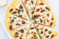 Lobster and Sun-Dried Cherry Tomato Polenta Pizza