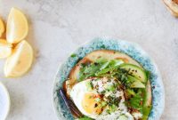 Crispy Egg Tostadas with Lemon Greens & Toasted Sesame Oil