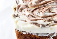 Carrot Cake Loaf with Nutella Swirl and Cream Cheese Frosting