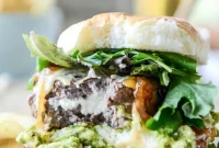Goat Cheese Guacamole Burgers with Cheddar & Caramelized Onions