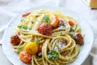 Roasted Garlic Butter Bucatini with Burst Cherry Tomatoes and Parmesan