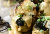 Roasted Cauliflower & Broccoli Stuffed Potatoes with Cheesy Butternut Sauce