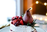 Caramelized Winter Fruit–Stuffed Brie with Pinot-Poached Pear (Video)