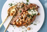 Slow-Roasted Sweet Potatoes with Spicy Garlic Chickpeas and Blue Cheese Sauce