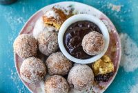 Pumpkin Cider Doughnut Holes Drizzled with Hot Fudge