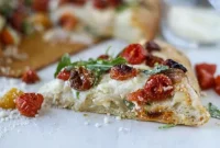 Slow-Roasted Cherry Tomato Pizza with Garlic Cream and Arugula