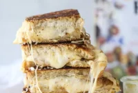 Gruyère French Onion Grilled Cheese with Thyme Butter (Video)