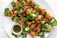 Cantaloupe Prosciutto Caprese Skewers with Lemon-Mint Pesto