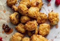Crispy Baked Popcorn Chicken with Raspberry Hot Honey Drizzle