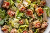 Caesar Salad Topped with Crispy Pizza Croutons