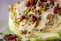 Broiled Iceberg Wedge Salad with Pomegranate Seeds & Pistachios