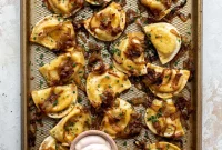 Sheet Pan Pierogies with Caramelized Onions & Chipotle Sour Cream