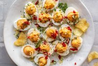 Pimento Cheese Deviled Eggs Topped with Crushed Potato Chips