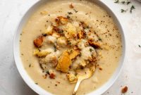 Creamy Cauliflower and White Bean Soup with Mustard Croutons