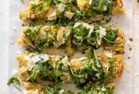 Crispy Potato and Gruyère Pizza Topped with Peppery Arugula