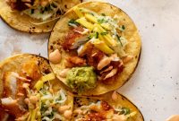Crispy Fish Tacos with Fresh Mango Slaw Recipe