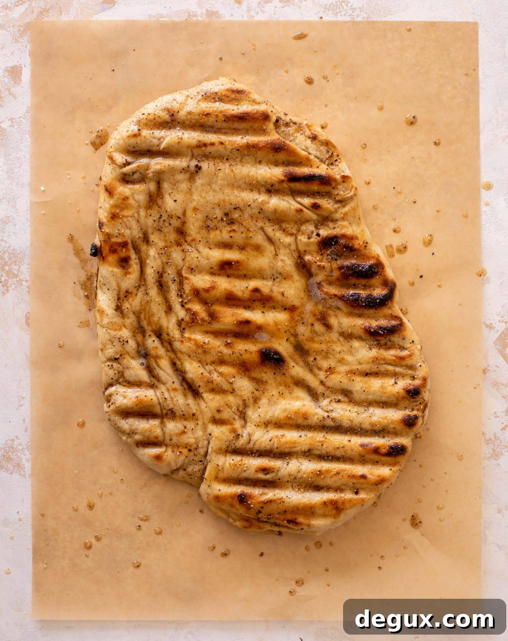 grilled cacio e pepe pizza with caesar