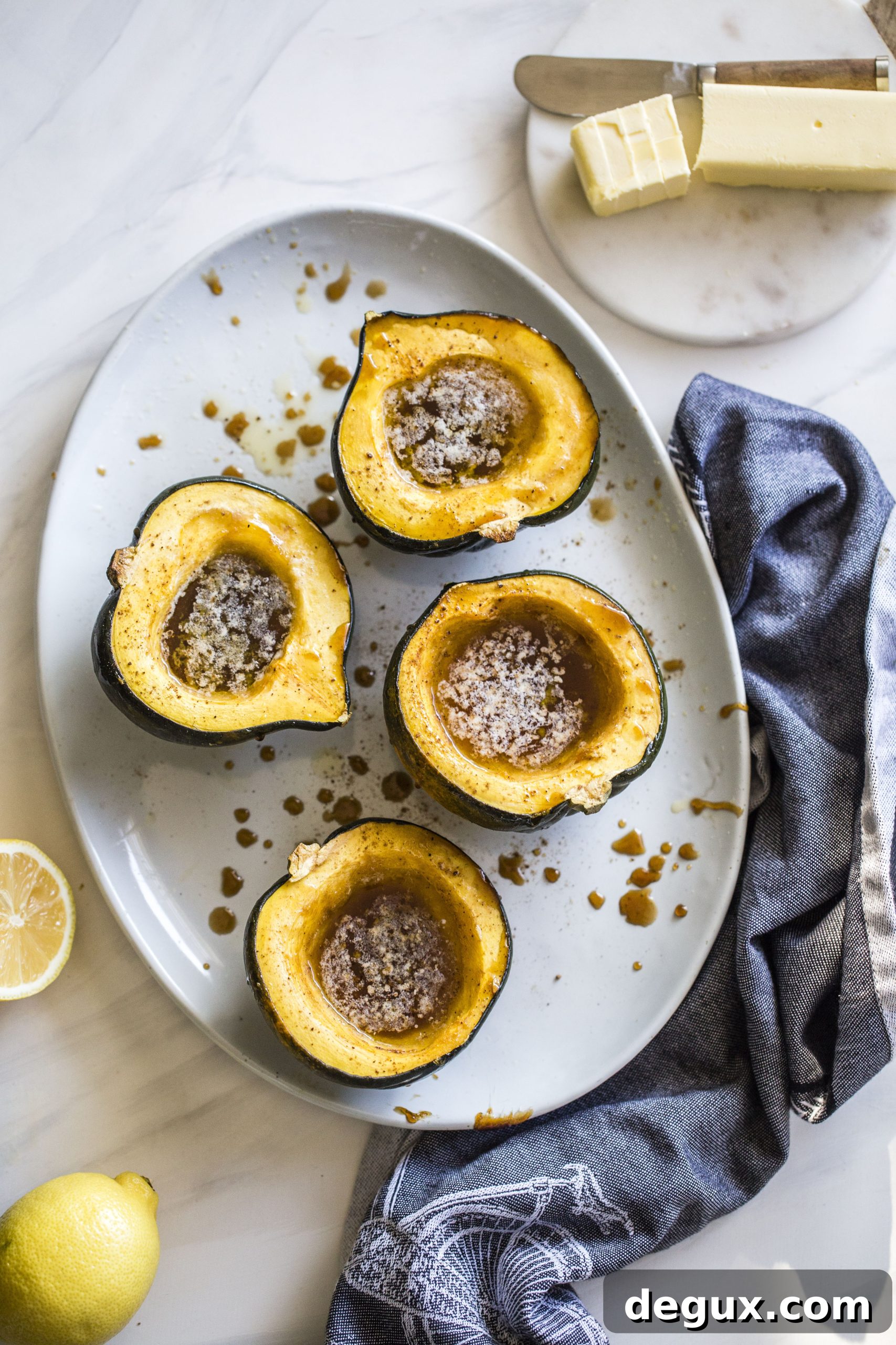 Baked Acorn Squash with Vanilla Bourbon and Balsamic Glaze 5 This baked acorn squash recipe is so delicious for the fall! It's made with vanilla and bourbon, finished with balsamic, is super easy, a bit indulgent and perfect for the season. Makes for a fabulous side dish in autumn or even a dessert! I howsweeteats.com #acorn #squash #baked #vanilla #bourbon