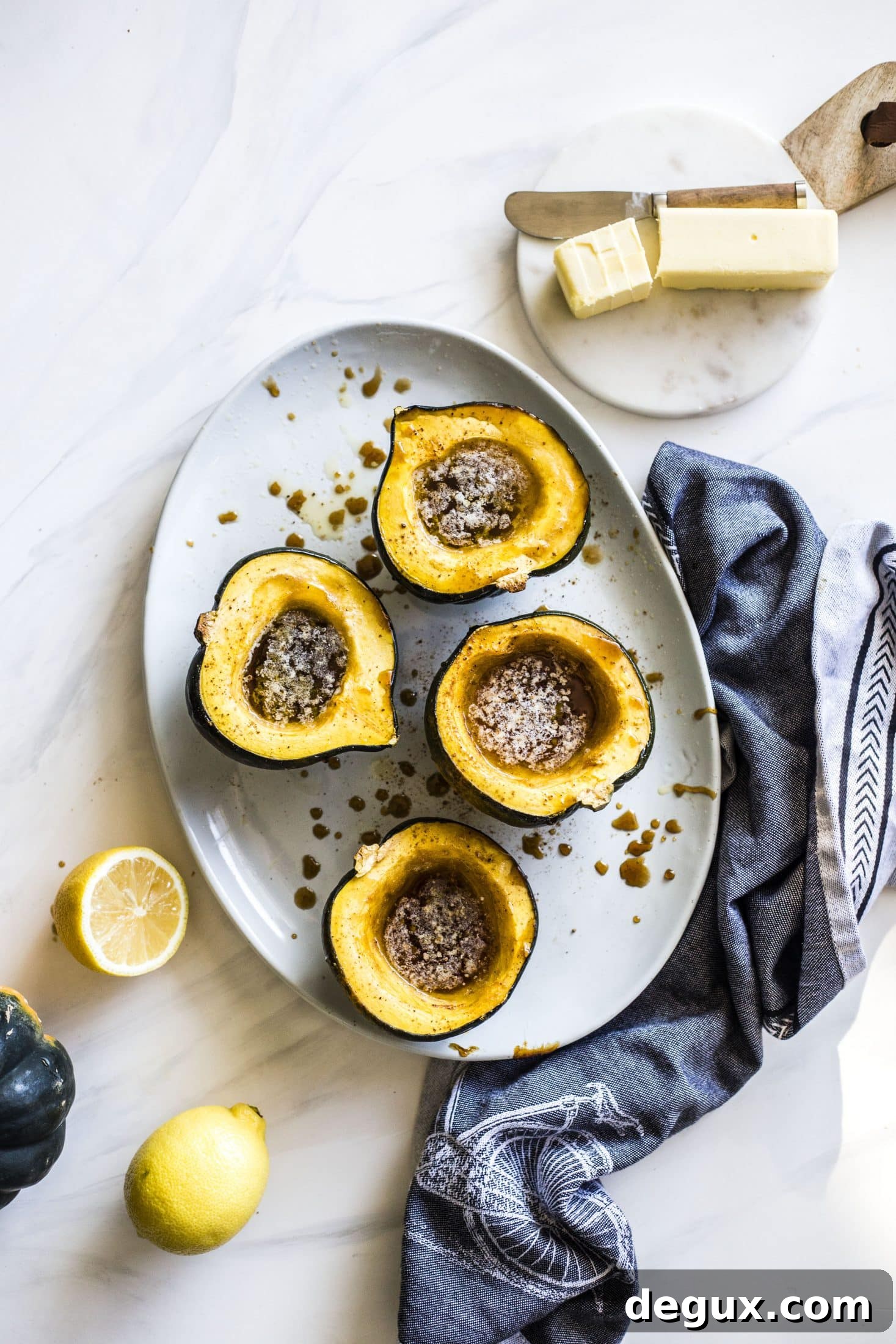 Baked Acorn Squash with Vanilla Bourbon and Balsamic Glaze 7 This baked acorn squash recipe is so delicious for the fall! It's made with vanilla and bourbon, finished with balsamic, is super easy, a bit indulgent and perfect for the season. Makes for a fabulous side dish in autumn or even a dessert! I howsweeteats.com #acorn #squash #baked #vanilla #bourbon