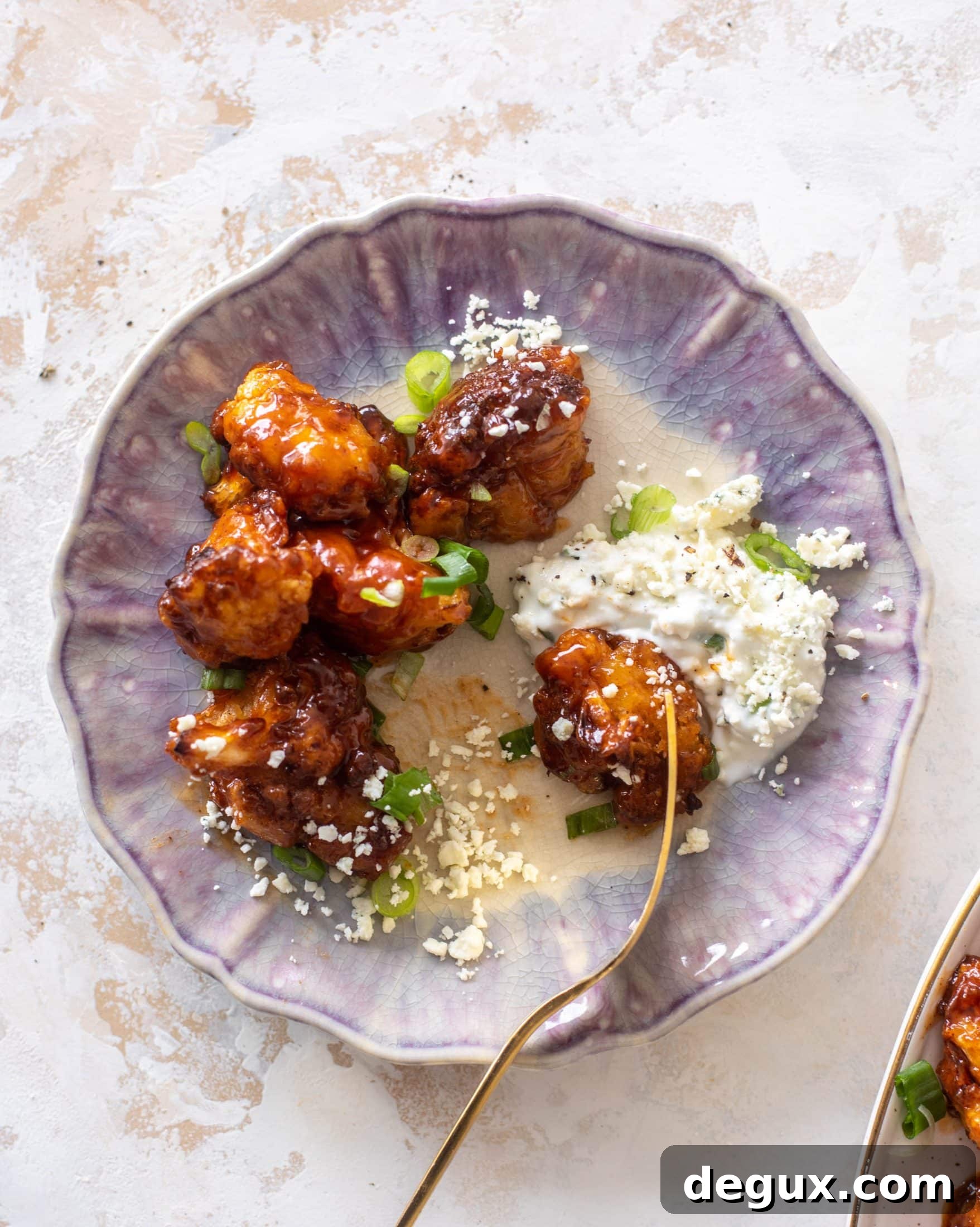 Sticky BBQ Cauliflower Bites with Greek Yogurt Blue Cheese Dip 12 sticky BBQ cauliflower bites