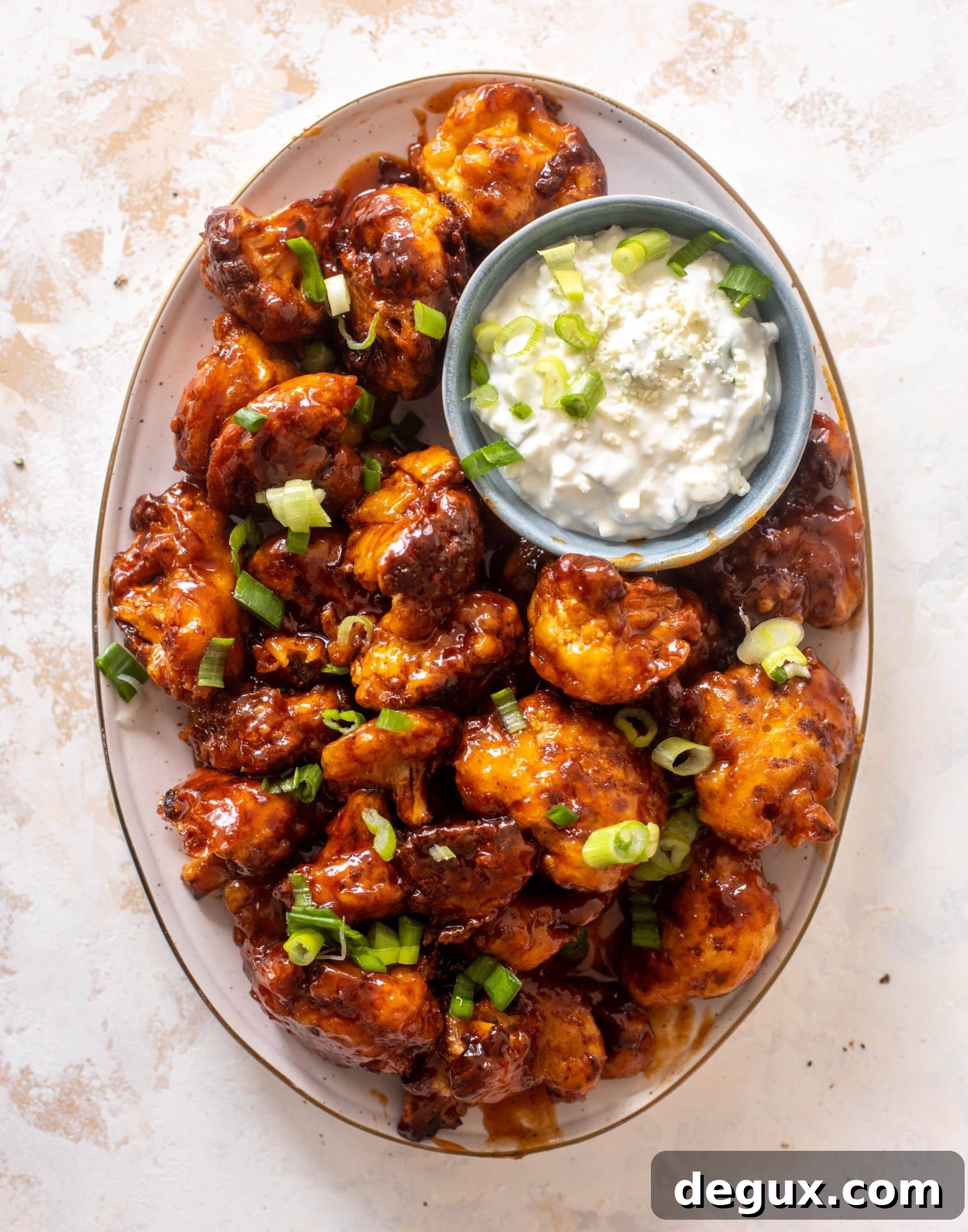 Sticky BBQ Cauliflower Bites with Greek Yogurt Blue Cheese Dip 7 sticky BBQ cauliflower bites