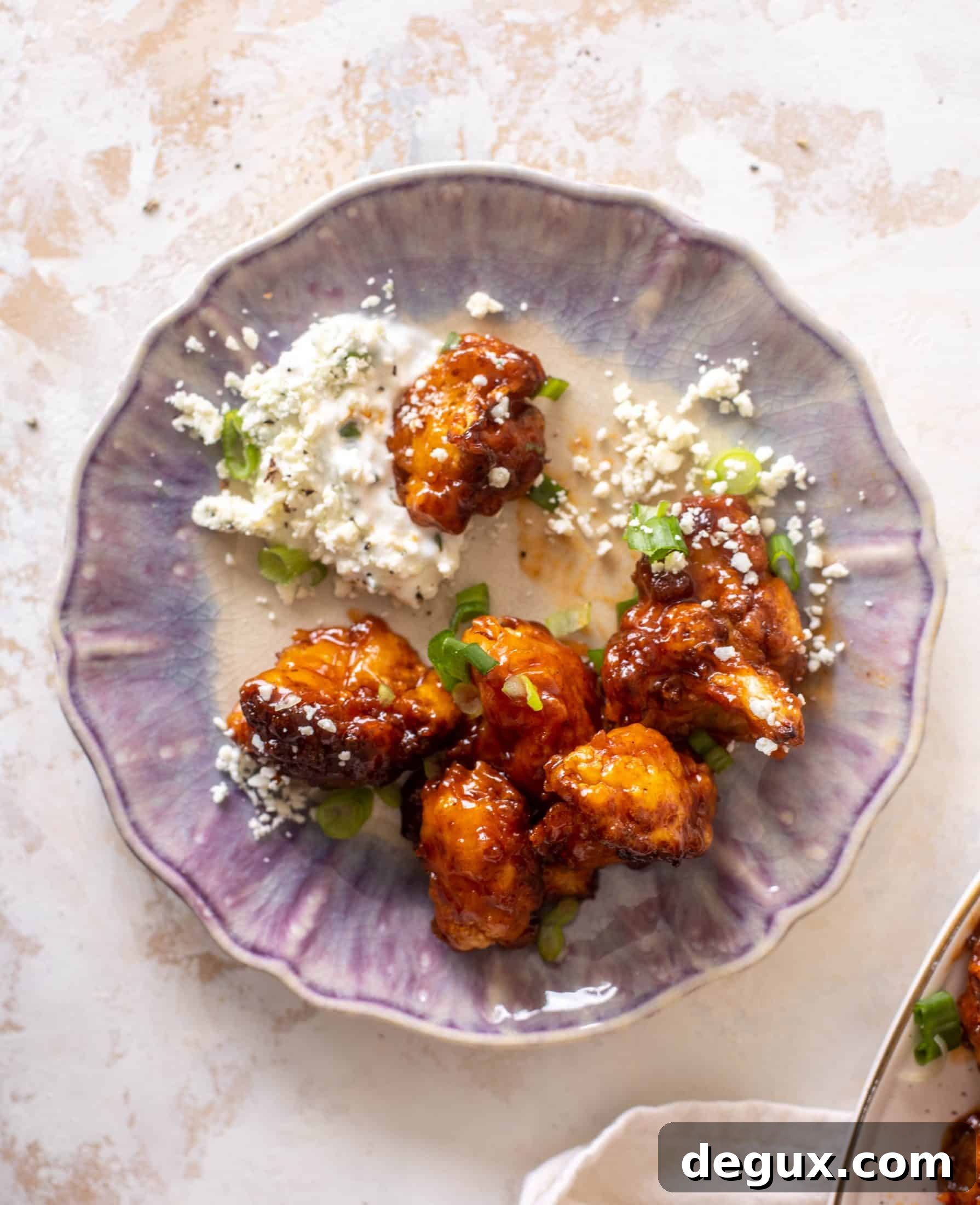 Sticky BBQ Cauliflower Bites with Greek Yogurt Blue Cheese Dip 8 sticky BBQ cauliflower bites