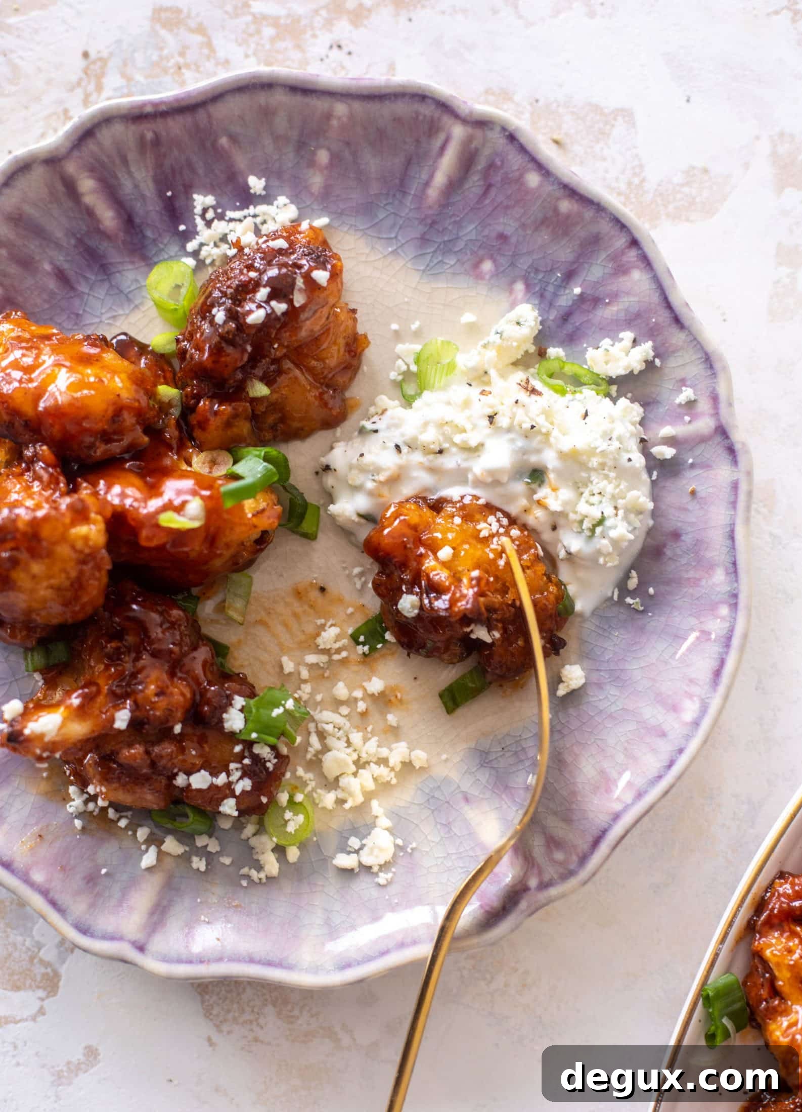 Sticky BBQ Cauliflower Bites with Greek Yogurt Blue Cheese Dip 10 sticky BBQ cauliflower bites