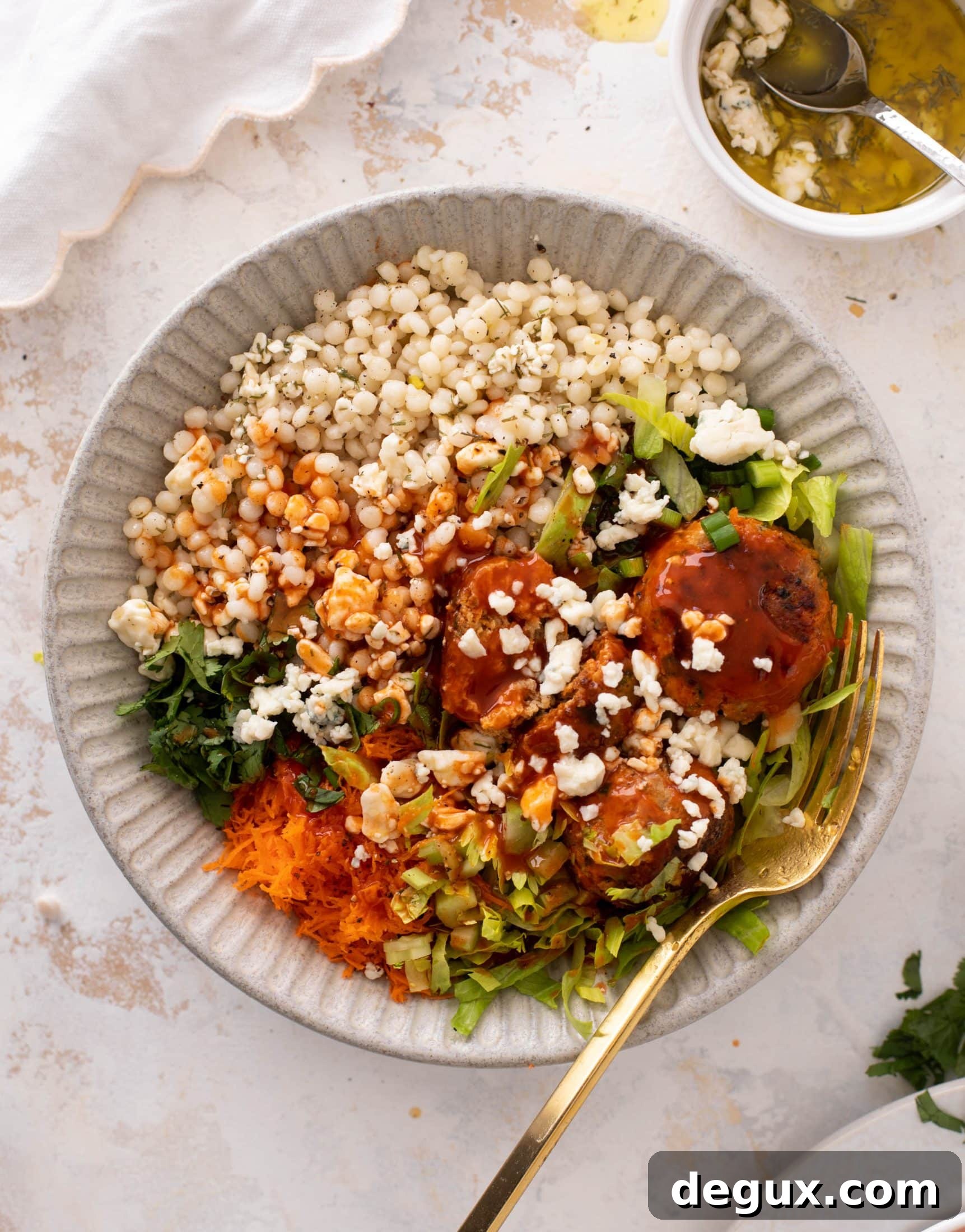 Buffalo Chicken Meatball Bowls with Ranch Slaw and Cauliflower Rice 11 buffalo chicken meatball bowls