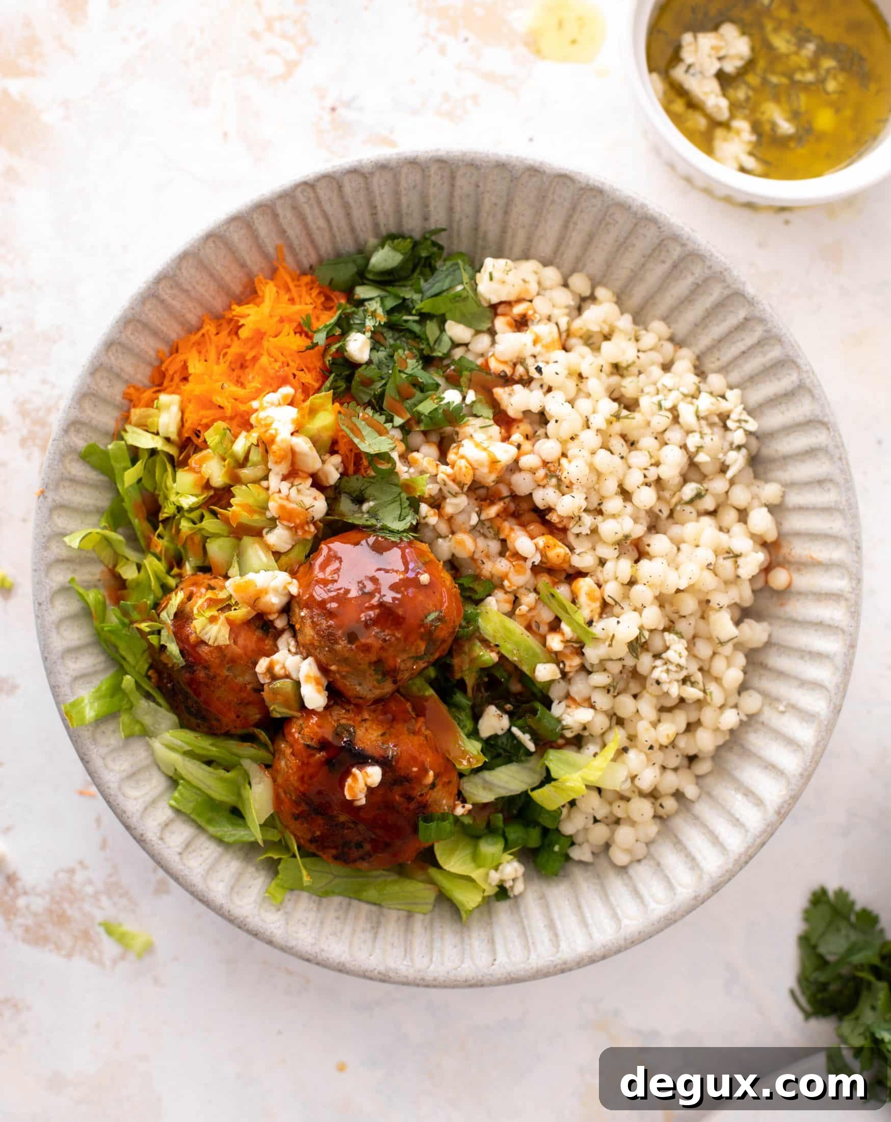 Buffalo Chicken Meatball Bowls with Ranch Slaw and Cauliflower Rice 5 buffalo chicken meatball bowls
