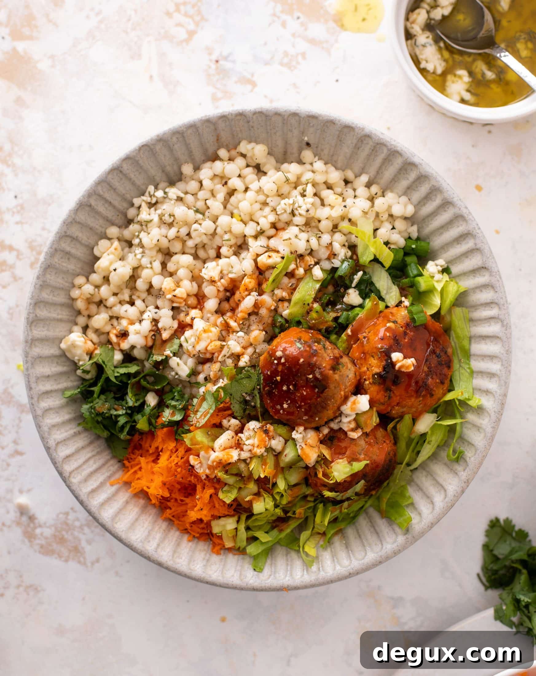 Buffalo Chicken Meatball Bowls with Ranch Slaw and Cauliflower Rice 6 buffalo chicken meatball bowls
