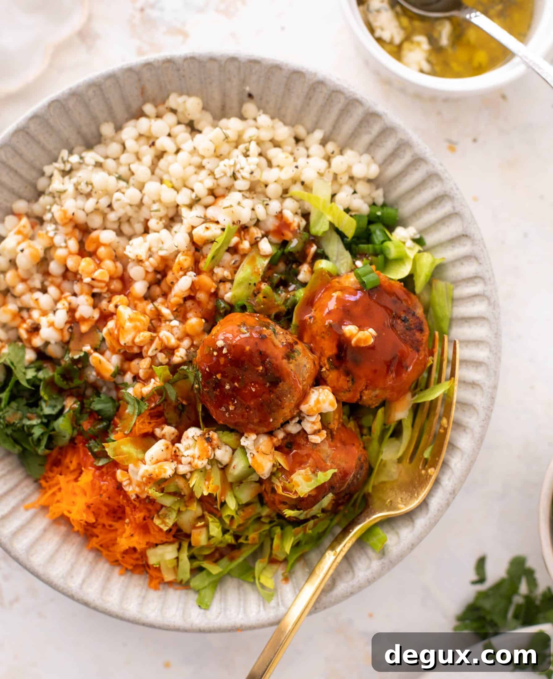 Buffalo Chicken Meatball Bowls with Ranch Slaw and Cauliflower Rice 8 buffalo chicken meatball bowls