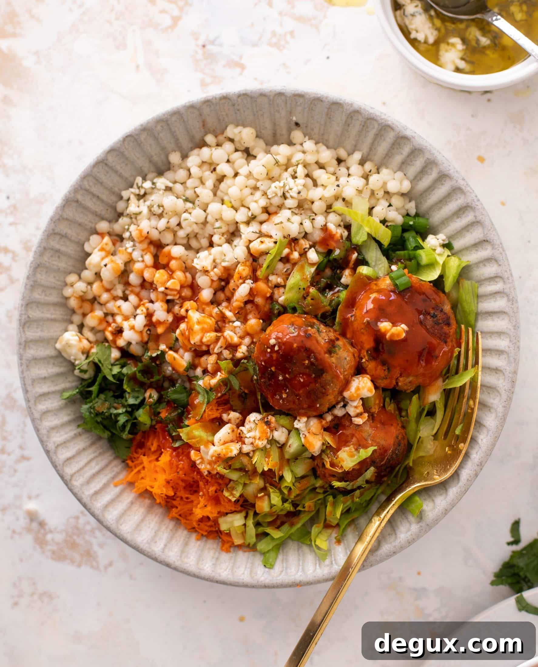 Buffalo Chicken Meatball Bowls with Ranch Slaw and Cauliflower Rice 9 buffalo chicken meatball bowls