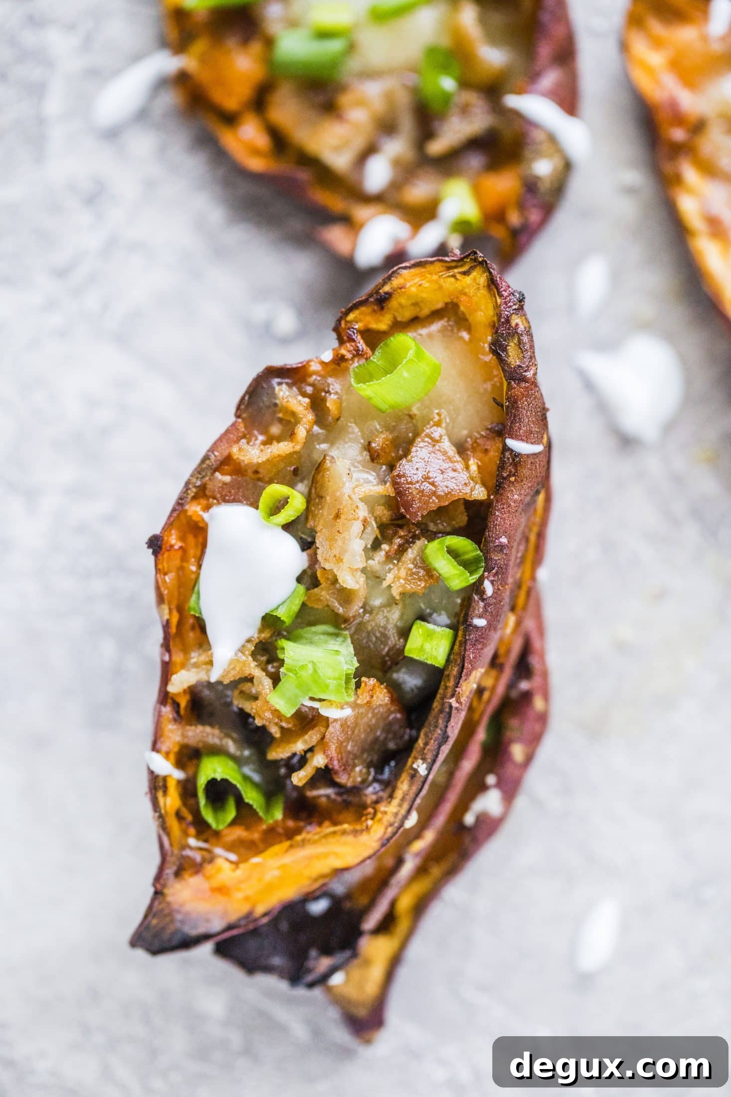 Savory Sweet Potato Skins Recipe with Cheesy Bacon Filling 4 savory loaded sweet potato skins I howsweeteats.com