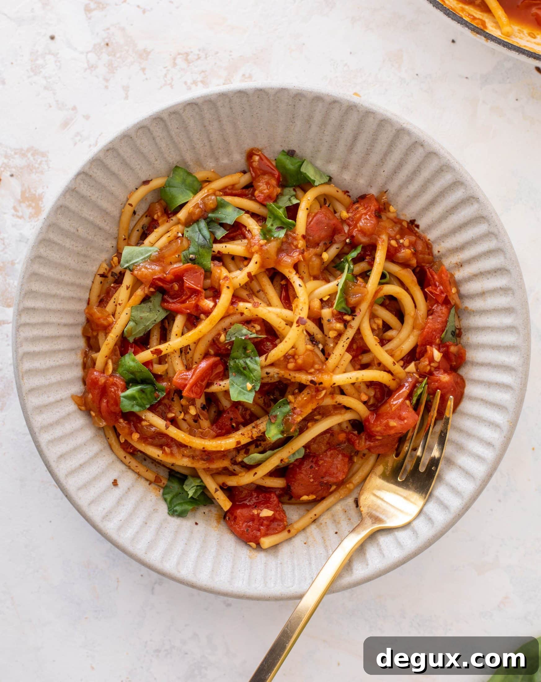 Bucatini in Winter Tomato Sauce with Roasted Garlic & Herbs 2 winter burst tomato sauce