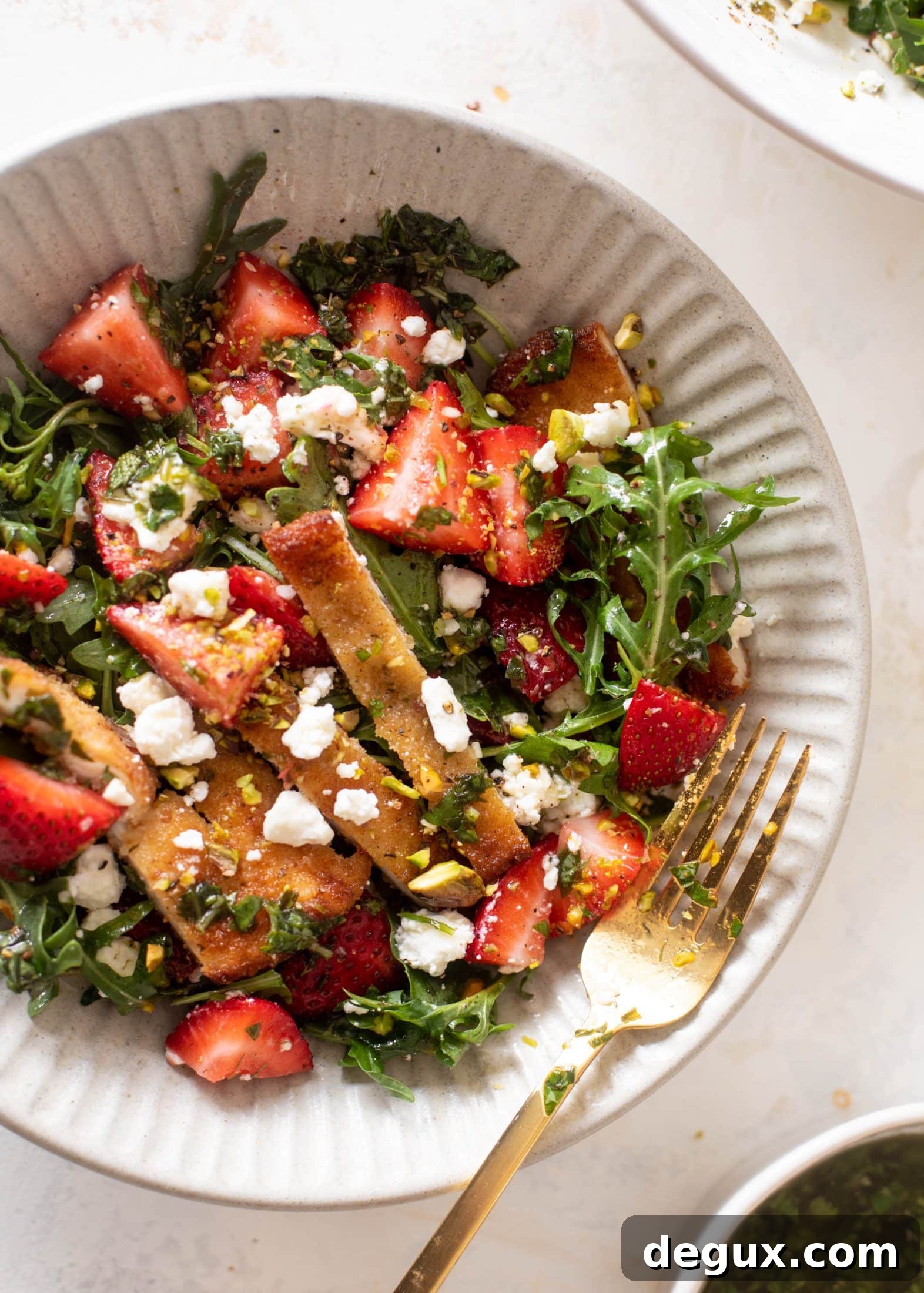 strawberry pistachio salad with crispy chicken