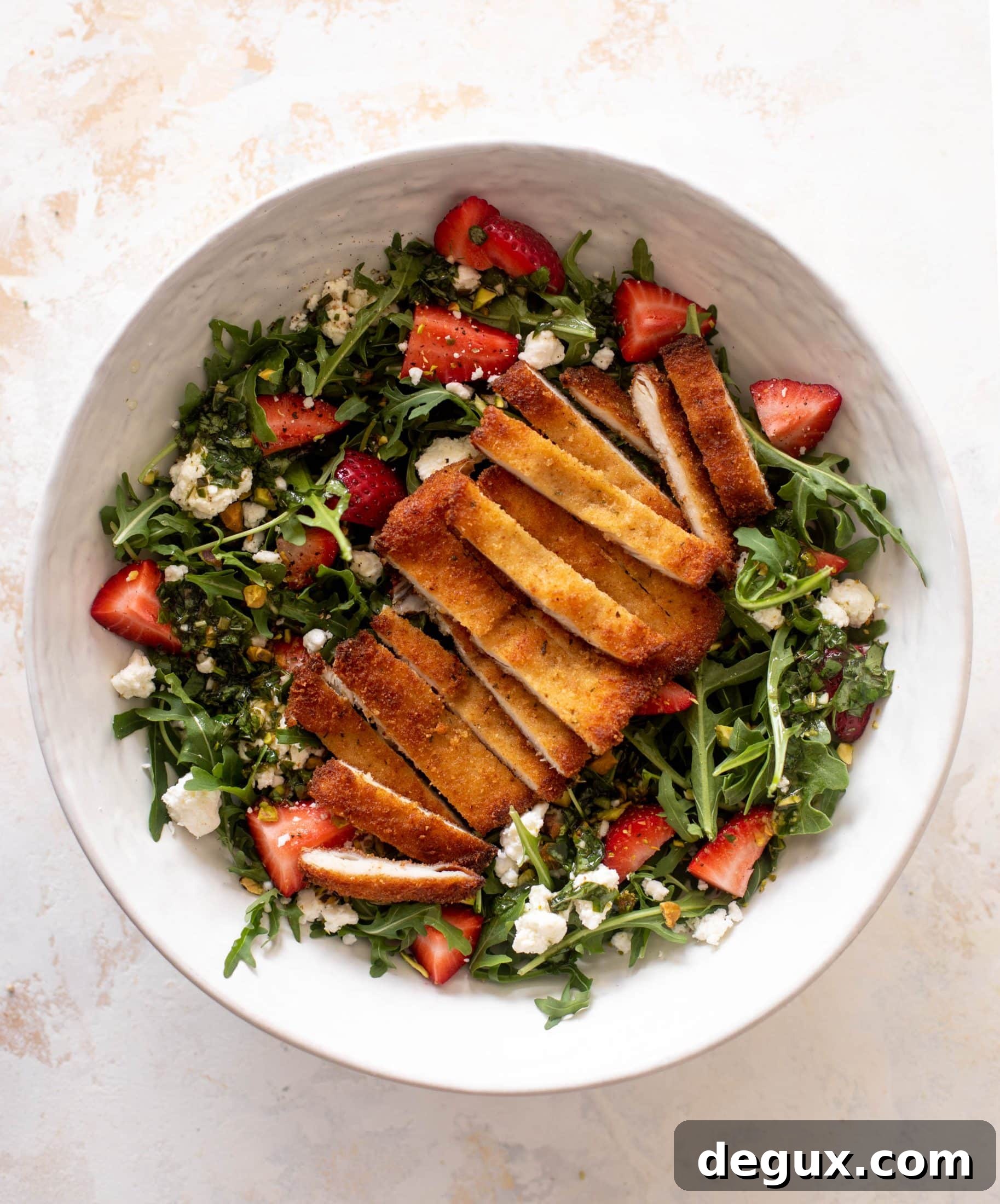 strawberry pistachio salad with crispy chicken