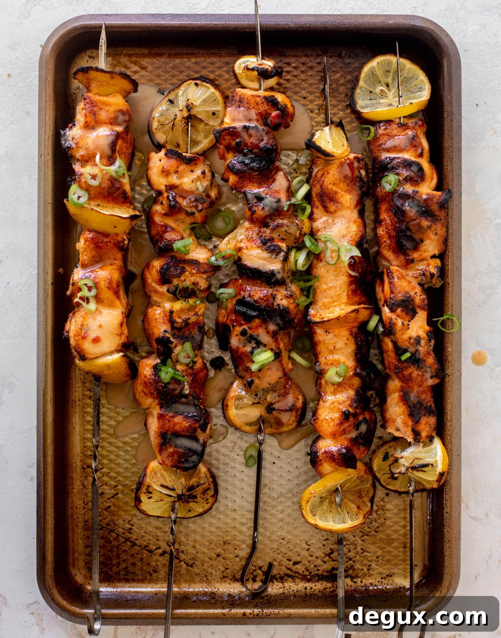Grilled Bang Bang Salmon Skewers with Crisp Cucumber Salad 7 grilled bang bang salmon with cucumber salad