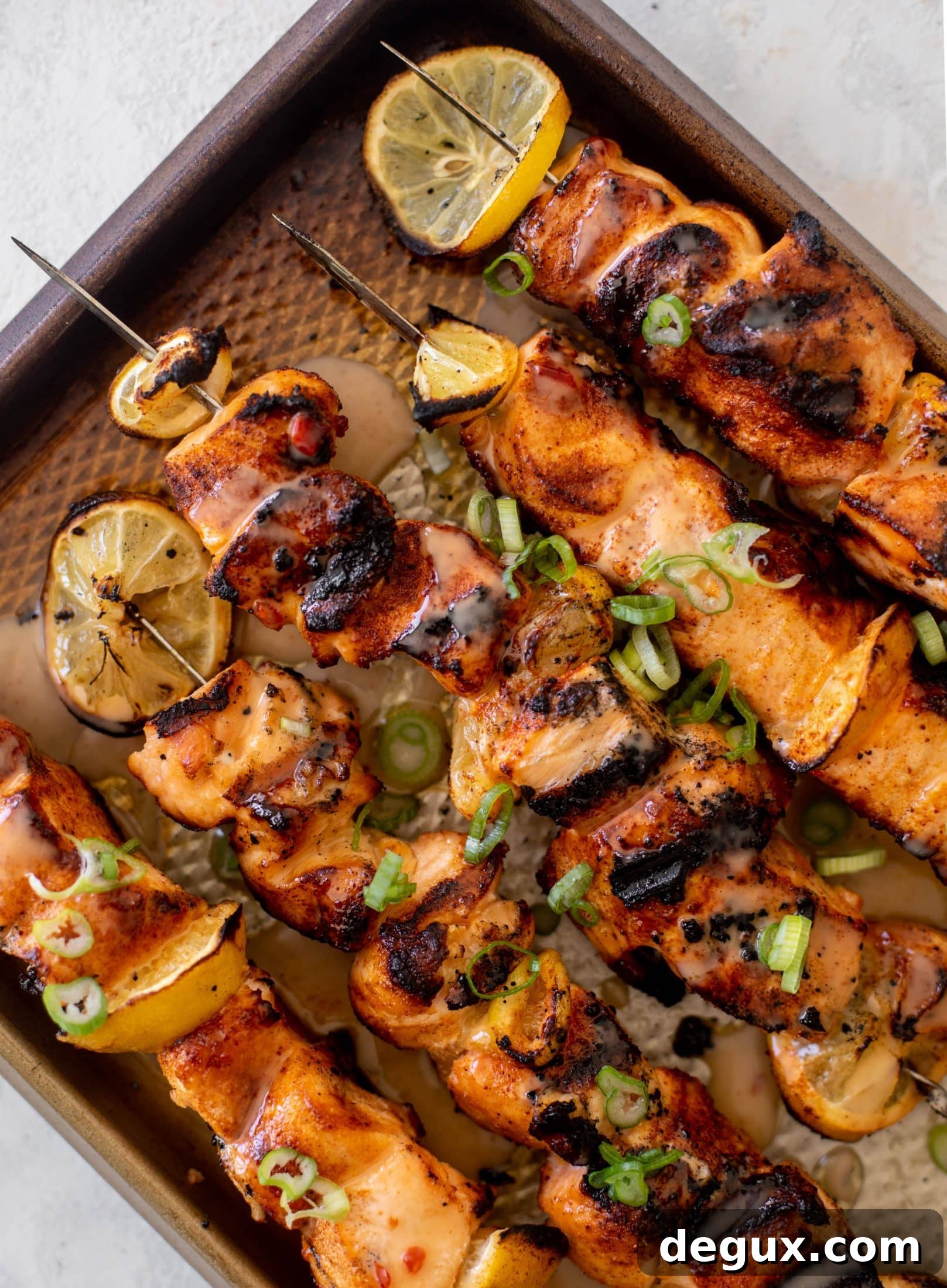 Grilled Bang Bang Salmon Skewers with Crisp Cucumber Salad 9 grilled bang bang salmon with cucumber salad