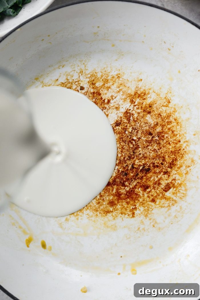 pour heavy cream into pan