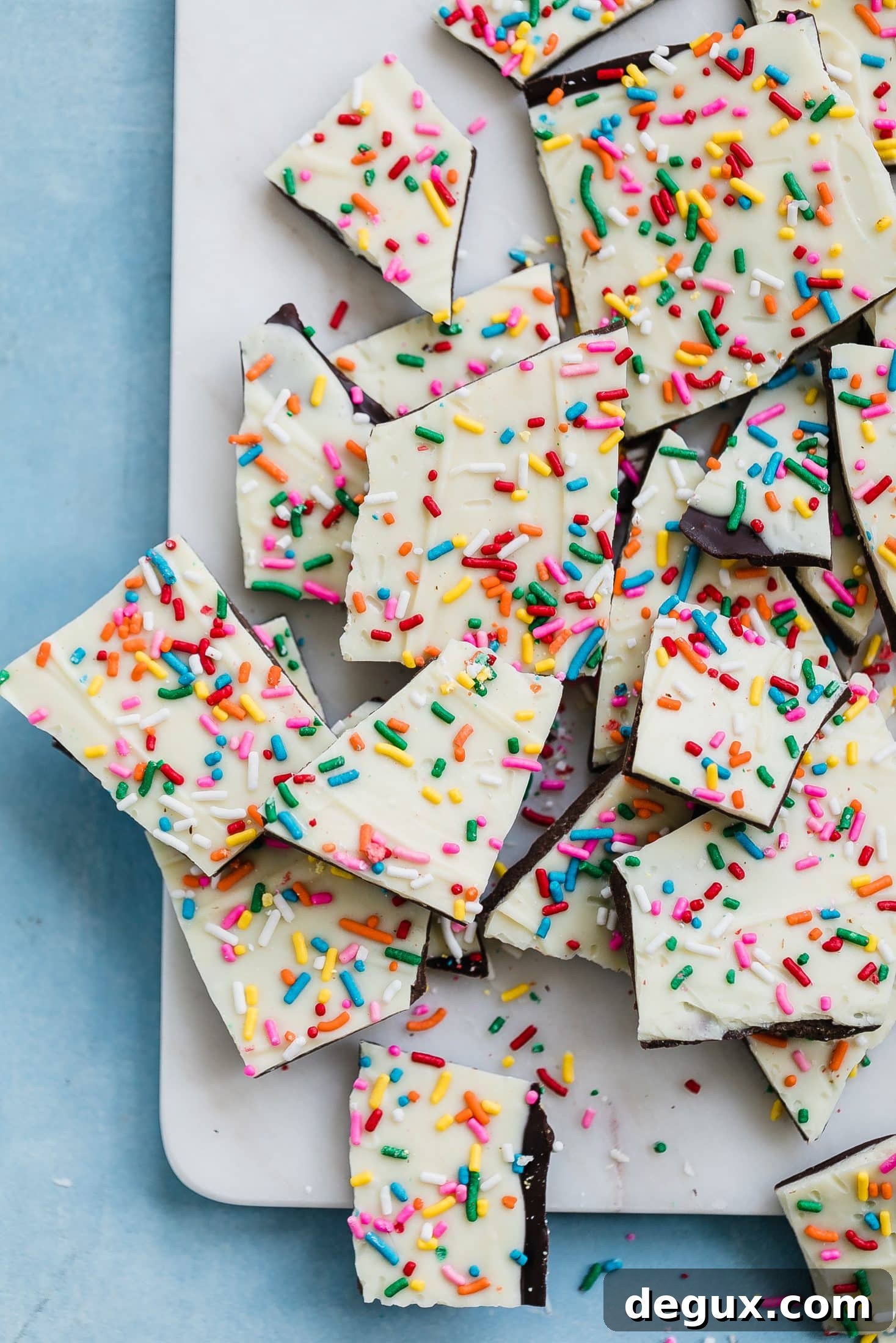 cake batter chocolate bark I howsweeteats.com #cakebatter #chocolate #bark #desserts #christmas