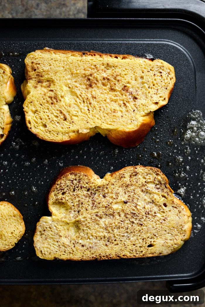 Baileys Irish Cream French Toast Recipe for Brunch or Dessert 14 work in batches cooking the French toast