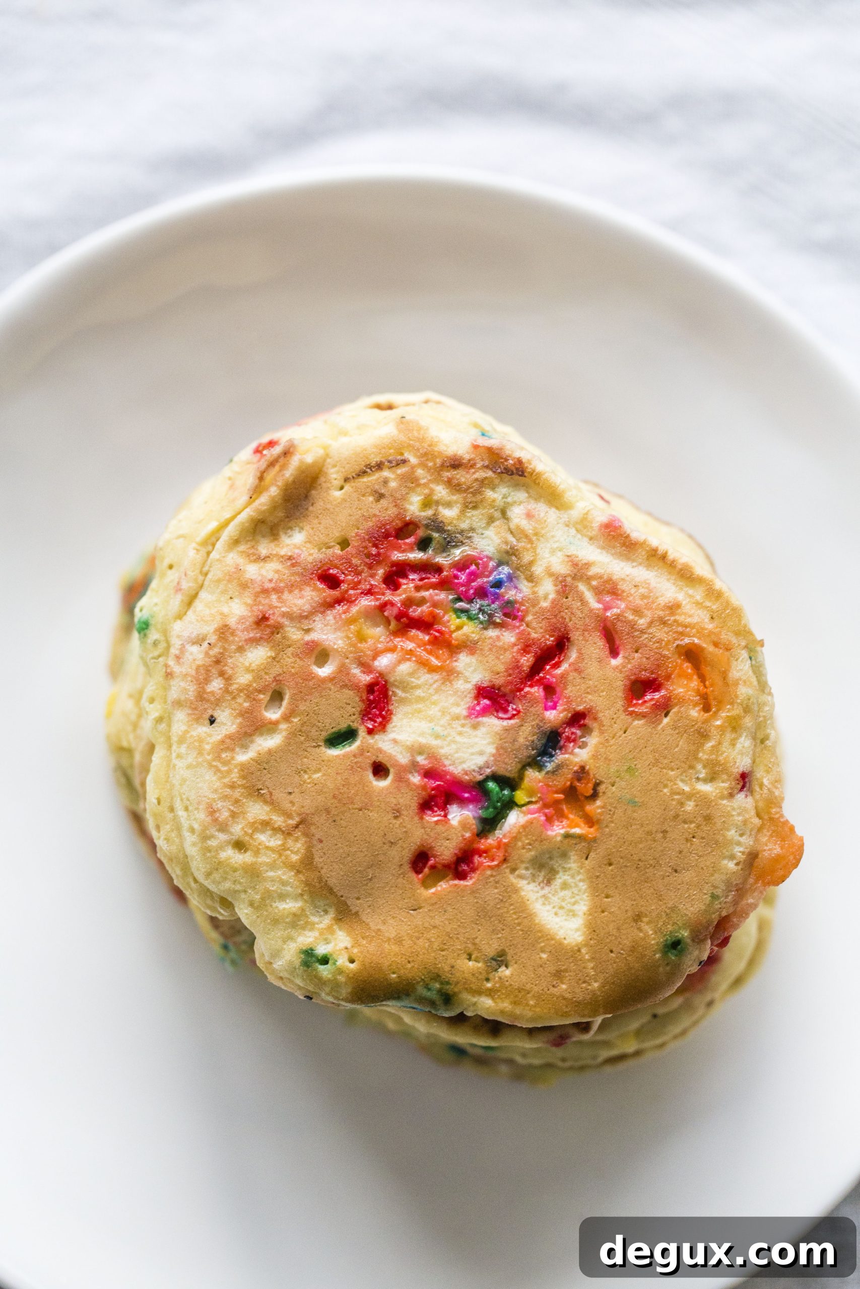 cake batter pancakes I howsweeteats.com #cakebatter #pancakes #breakfast #sprinkles #funfetti