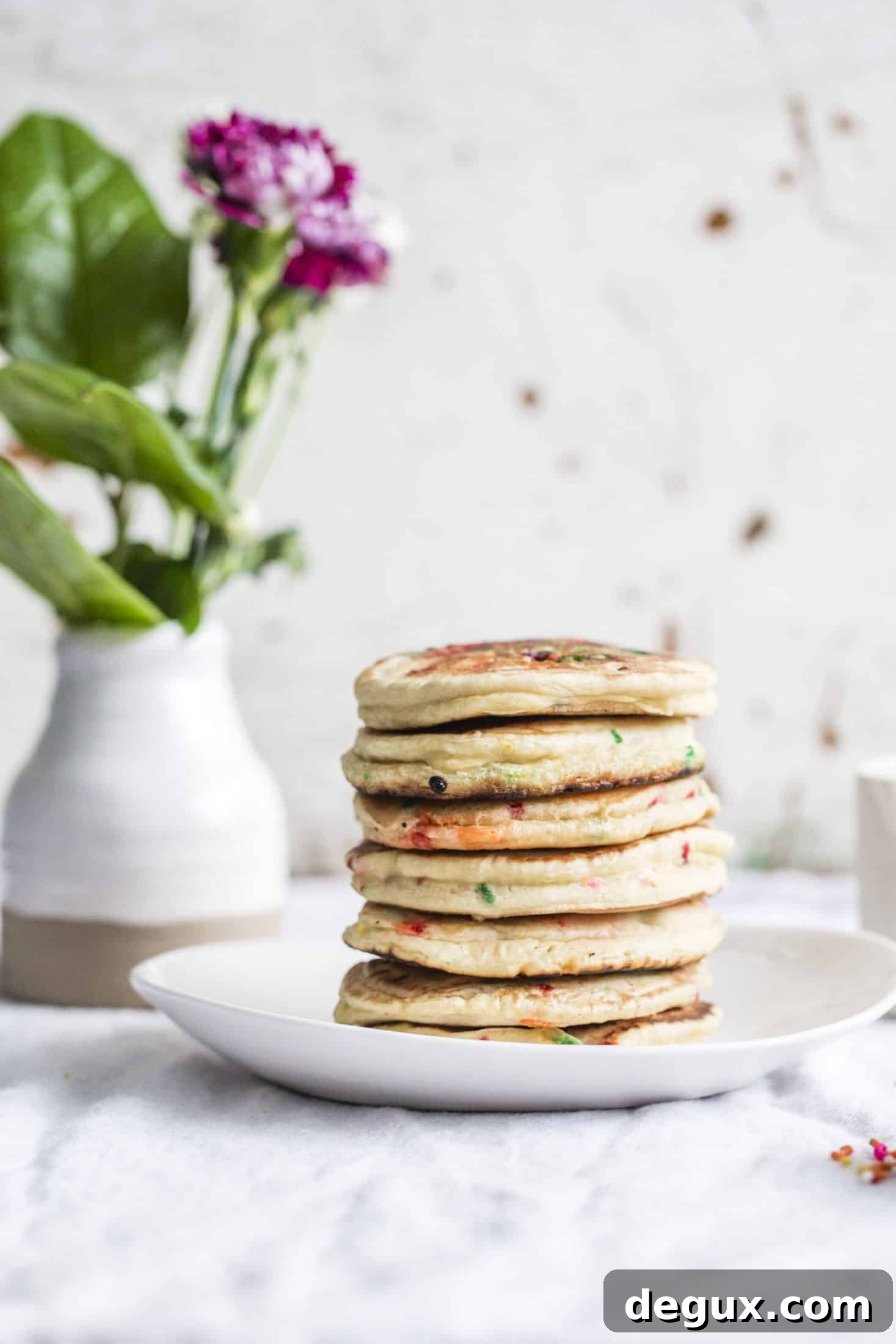 cake batter pancakes I howsweeteats.com #cakebatter #pancakes #breakfast #sprinkles #funfetti